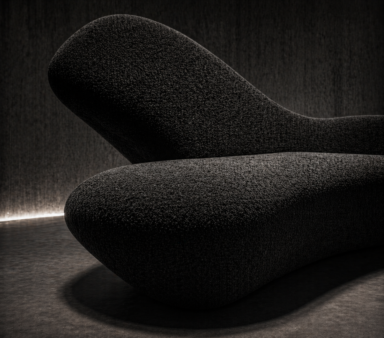Close detail of UMBRA material texture and curved form.